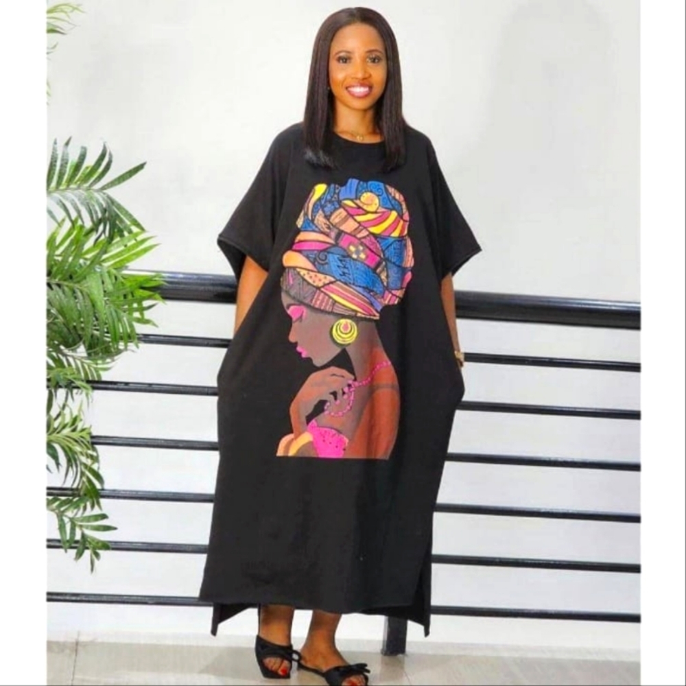 NWT - Gorgeous Black Kaftan with Woman Print
Pit to Pit 33 inches